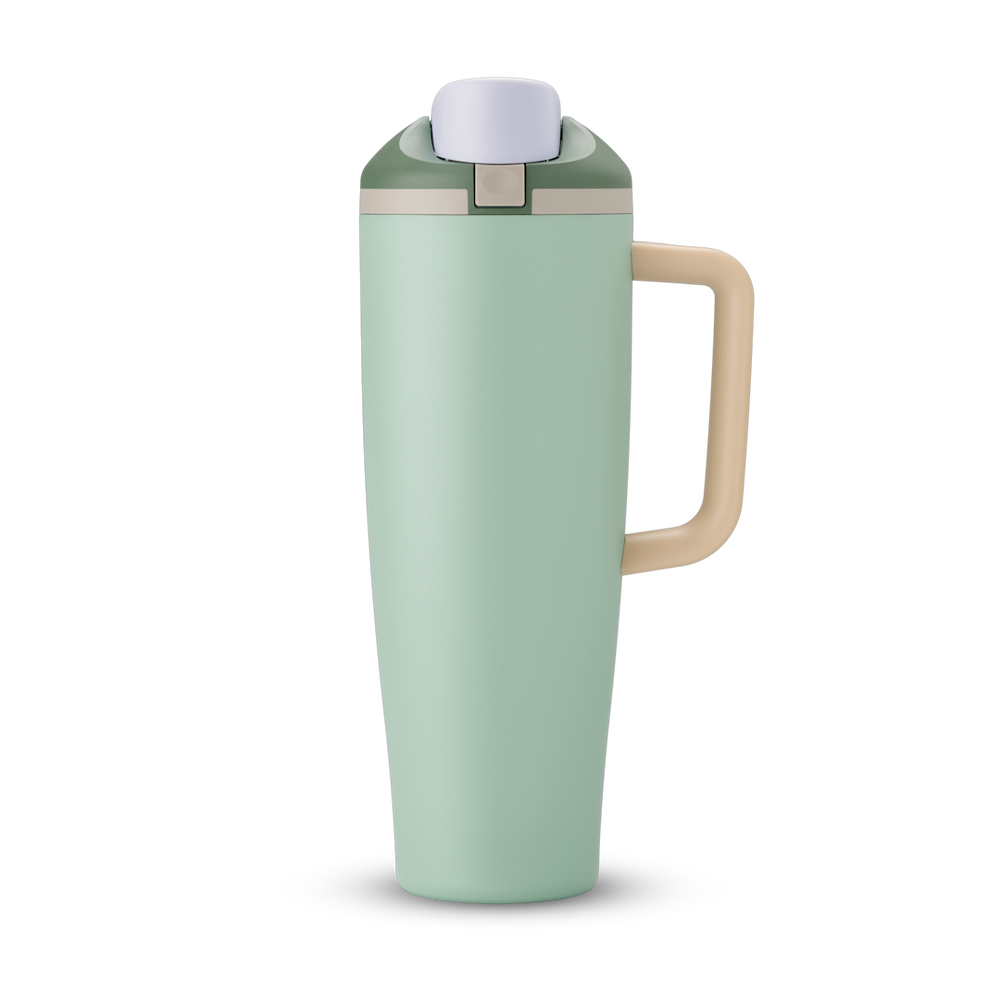 FreeSip Tumbler 40oz in Eucalyptus — soft sage green body with matching lid and beige handle, viewed from the handle side